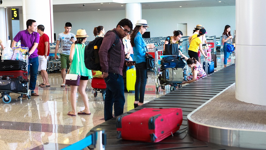 Hành khách quốc tế đến sân bay Nội Bài - hinh 4